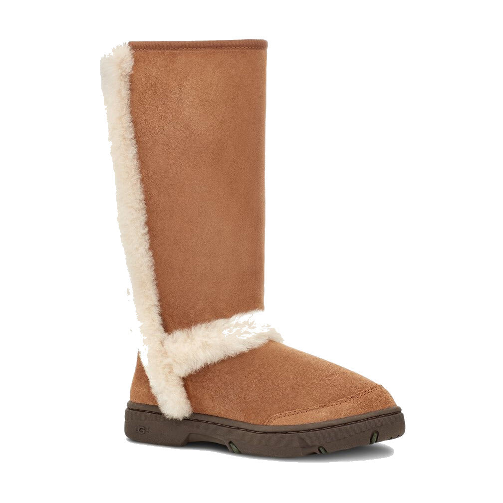 A single tan, knee-high boot with a Twinface sheepskin lining and flat sole, made from suede material. This UGG SUNBURST TALL CHESTNUT - WOMENS by Ugg features luxurious comfort and style.