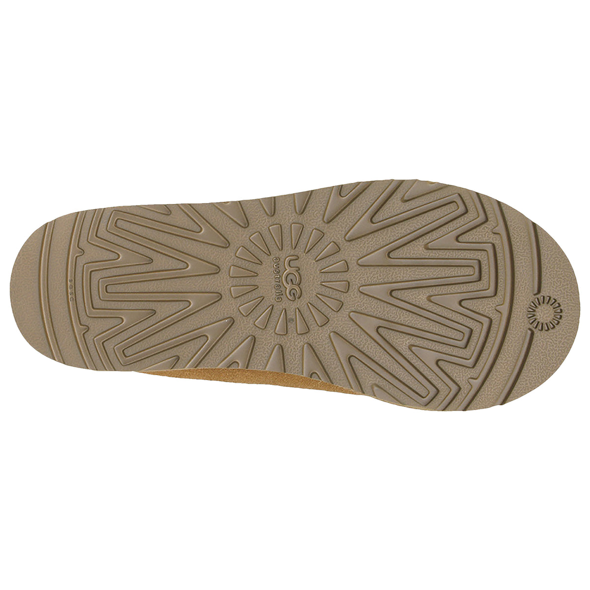 The image shows the sole of a tan UGG TASMAN CHESTNUT - WOMENS boot with a central circular logo and a pattern of thick, multidirectional tread lines, featuring Treadlite by Ugg™ for added comfort.