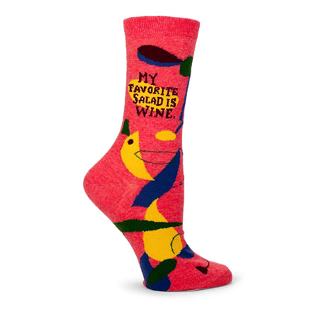 A red sock with abstract colorful shapes and the text &quot;MY FAVORITE SALAD IS WINE,&quot; this Blue Q My Favorite Salad Is Wine Crew Sock from Blue Q adds a quirky twist to women&#39;s crew socks.