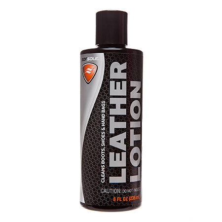 A bottle of SOFT SOLE LEATHER LOTION 8 OZ with an 8 fl oz (236 ml) capacity, designed for cleaning boots, shoes, and handbags. It cleans and conditions smooth leather footwear. The front label includes safety warnings and usage instructions.