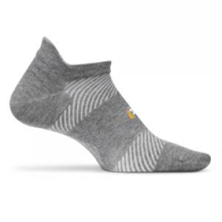 A single Feetures FEETURES HIGH PERFORMANCE ULRTA LIGHT NO SHOW TAB SOCK GREY featuring light gray stripes, a small yellow logo on the side, and high-performance moisture-wicking fabric.