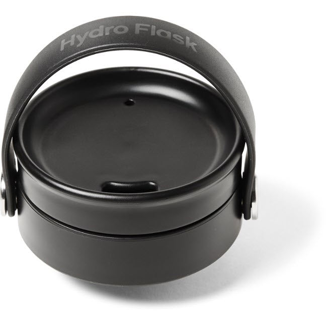 A black Hydro Flask lid with a flexible carry strap and a circular design, the HYDRO FLASK WIDE MOUTH FLEX SIP CAP BLACK perfectly complements Hydro Flask Thermal Bottles.