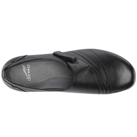 Top view of a black leather slip-on shoe with a cushioned footbed and a subtle elastic gore for ease of wear, reminiscent of the comfort found in **Dansko DANSKO FRANNY MILLED NAPPA BLACK - WOMENS** designs.