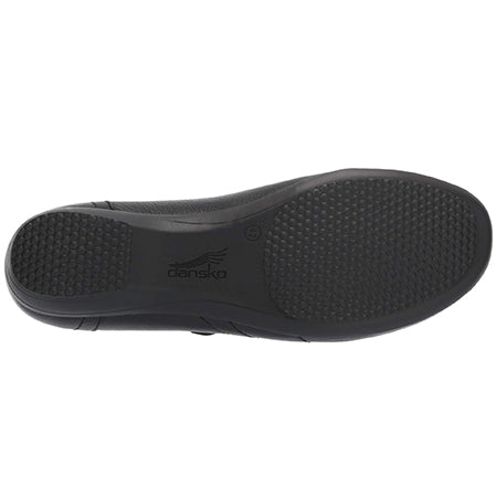 Bottom view of a DANSKO FRANNY MILLED NAPPA BLACK - WOMENS Dansko shoe, displaying a textured sole pattern for grip and an adjustable hook and loop instep closure.