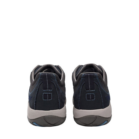 Rear view of a pair of DANSKO PAISLEY MILLED NUBUCK NAVY - WOMENS sneakers with gray soles and blue stitching accents, featuring a waterproof upper by Dansko.