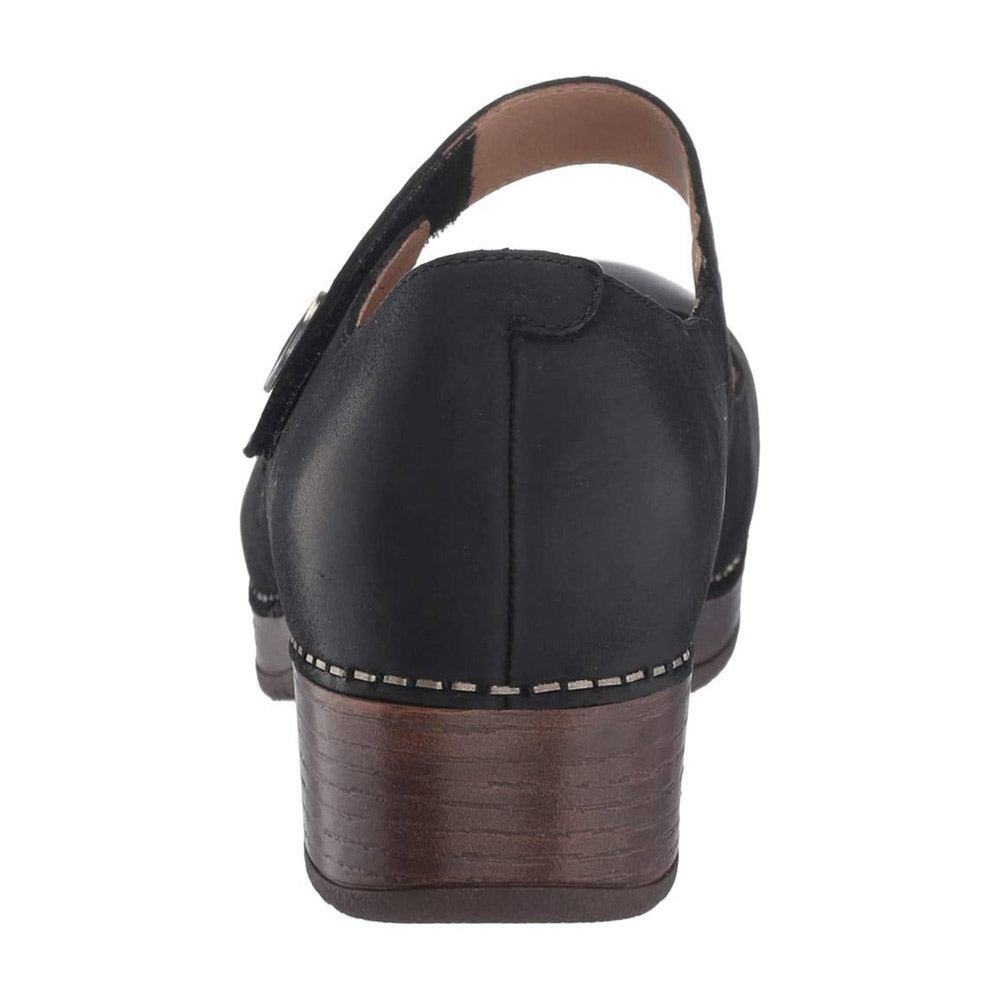 Rear view of the DANSKO BEATRICE BLACK BURNISHED - WOMENS, a single black women&#39;s shoe featuring a slingback strap and a wooden block heel, known for its stain resistance.