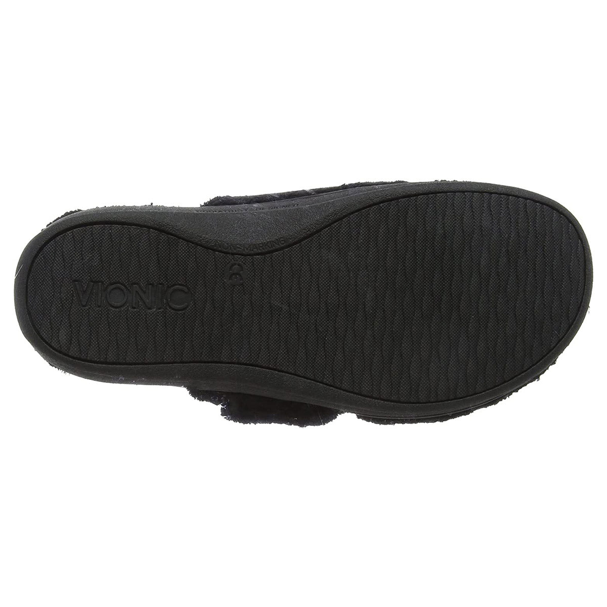 The image shows the sole of a black VIONIC GEMMA BLACK - WOMENS slipper with a textured surface and the brand name &quot;Vionic&quot; imprinted on it, highlighting its excellent arch support.