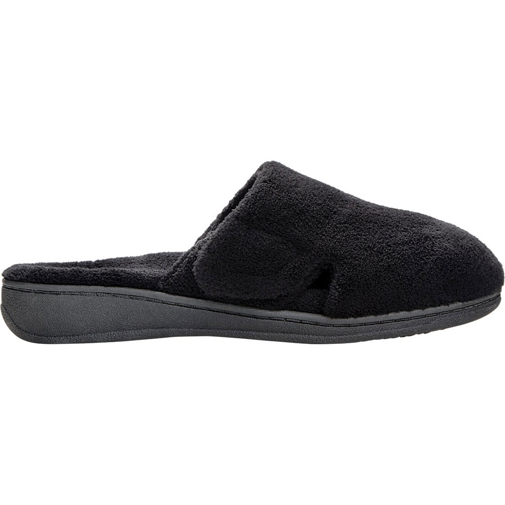 A Vionic VIONIC GEMMA BLACK - WOMENS slipper with a soft, fuzzy exterior and a rubber sole offers both comfort and arch support.