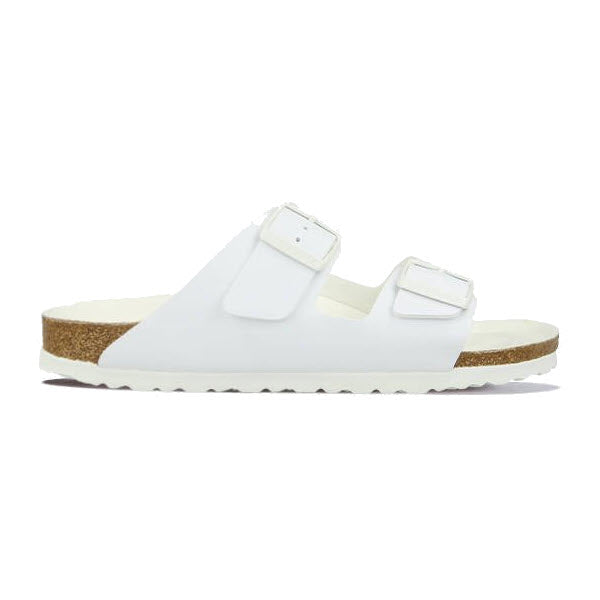 A Birkenstock BIRKENSTOCK ARIZONA WHITE BIRKOFLOR - WOMENS featuring a two-strap design with adjustable buckled straps, an anatomically shaped footbed, and a cork-soled base reminiscent of the classic Birkenstock Arizona.