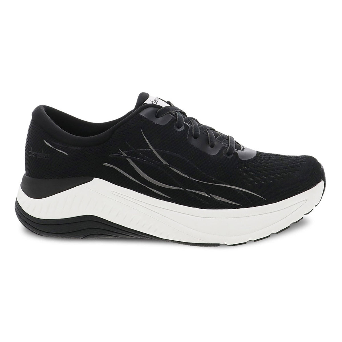 The Dansko Pace Black Mesh walking shoe for women features a black mesh upper with a lace-up closure and accents, paired with a white sole. The shoe incorporates Natural Arch Plus technology to provide enhanced comfort and support.