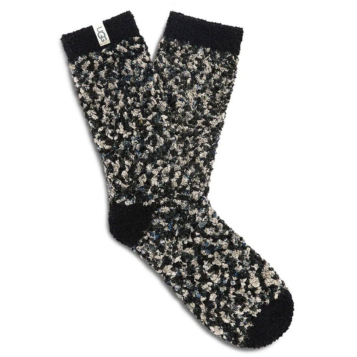 A pair of UGG COZY CHENILLE SOCKS BLACK - WOMENS with a small tag on the cuff, showcasing a confetti-like pattern.