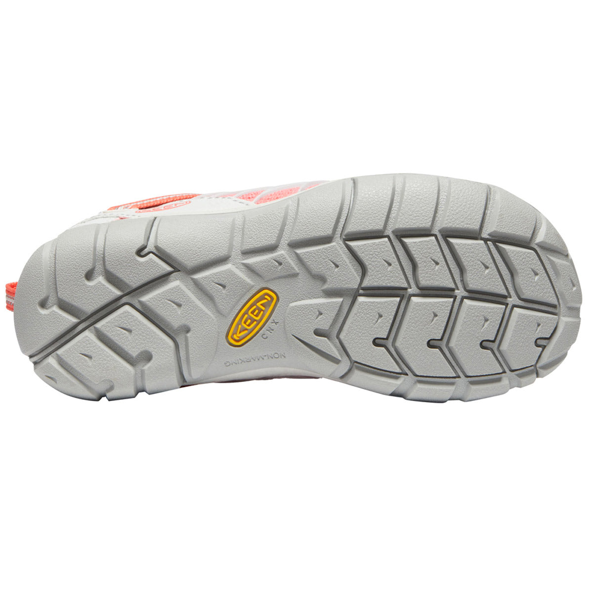 Bottom view of a KEEN CHANDLER CNX YOUTH DRIZZLE/DUBARRY - KIDS shoe with a grey, textured sole featuring deep treads, a multi-directional lug pattern, and the brand name &quot;Keen&quot; in yellow.