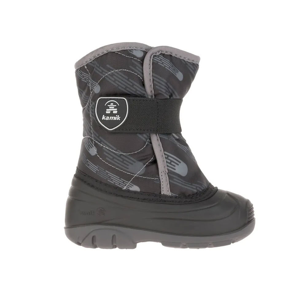 A single grey and black toddler's boot, the KAMIK SNOWBUG 4 PRINTED BLACK - TODDLERS from Kamik, features an insulated winter design with a Velcro strap, rubber sole, and printed pattern. Crafted with a waterproof nylon upper, these snow boots for toddlers ensure little feet stay warm and dry.