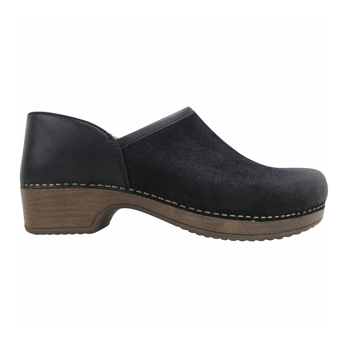 The Dansko DANSKO BRENNA BLACK BURNISHED SUEDE - WOMENS is a black clog with a wooden heel and a stitched seam along the sole, designed as a comfortable slip-on shoe. Its stain resistance ensures long-lasting wear and easy maintenance.