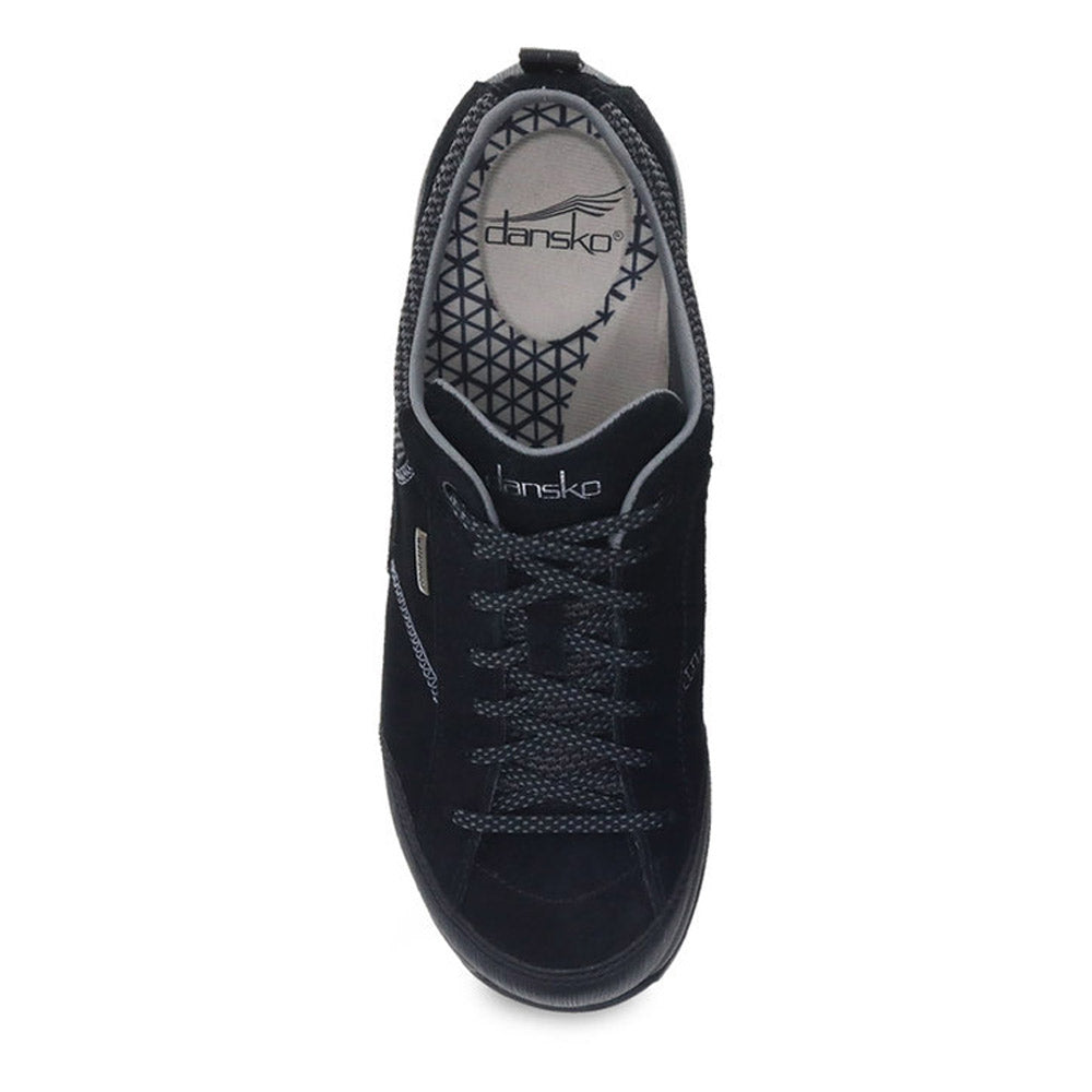 Top view of a black Dansko DANSKO PAISLEY BLACK/BLACK SUEDE - WOMEN sneaker with grey laces, a grey geometric-patterned insole, and an arch support footbed.