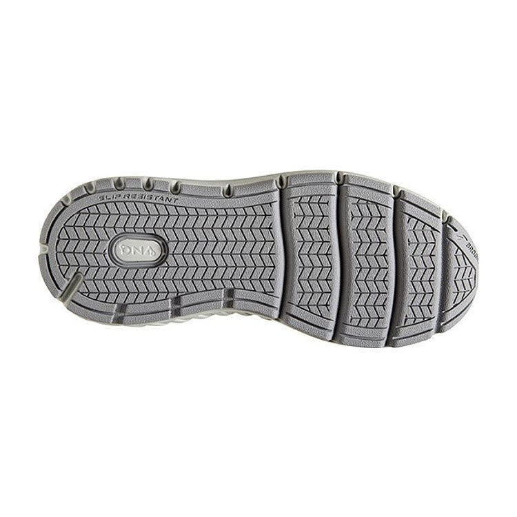 Bottom view of a light grey Brooks Addiction Walker Suede Shark/Alloy women&#39;s shoe sole with textured tread pattern and &quot;DNA&quot; branding in the center.