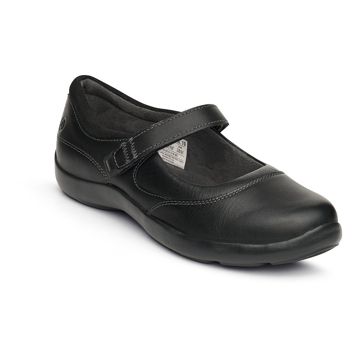 The ANODYNE CASUAL MARY JANE BLACK - WOMENS by Anodyne features a classic black leather design with a strap across the top and a small button detail on the side. This orthotic-friendly shoe boasts a rounded toe and cushioned sole for added comfort.