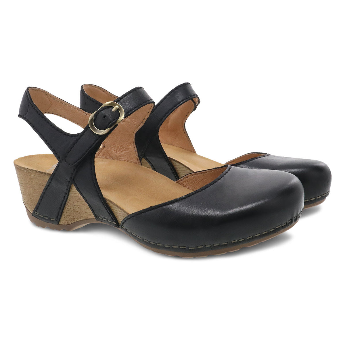 A pair of DANSKO TIFFANI BLACK - WOMENS with an ankle strap and buckle, featuring a rounded toe, stitching details, and burnished leather uppers for added elegance.