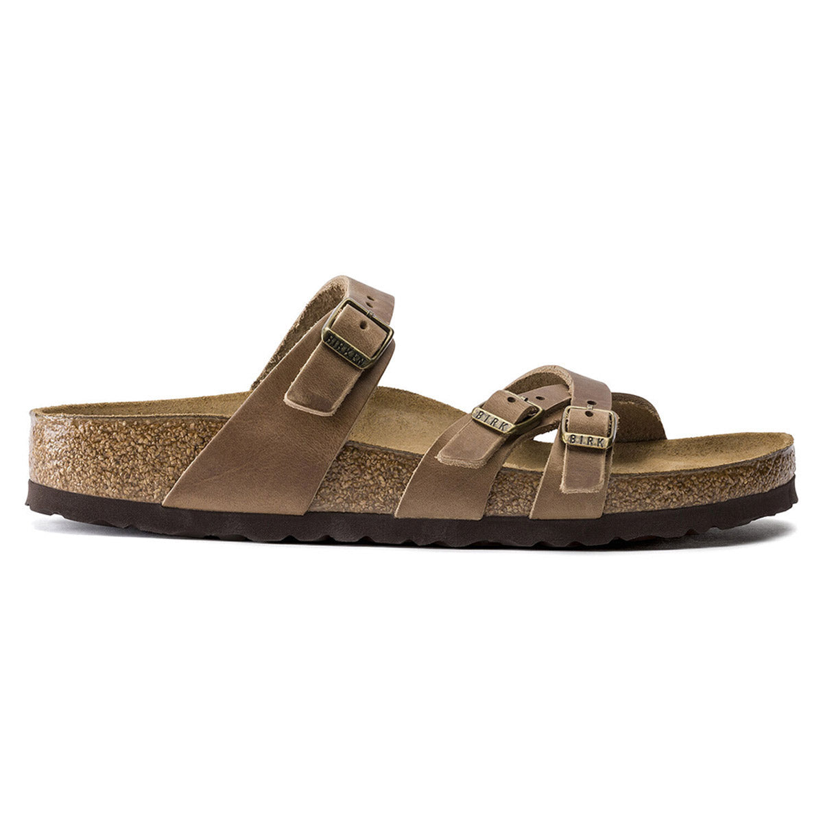 The Birkenstock Franca Tobacco sandal for women features an anatomically shaped footbed with a cork sole, oiled leather construction, and two adjustable straps with metallic buckles. It also boasts a slightly raised heel and a textured outsole for added comfort and traction.