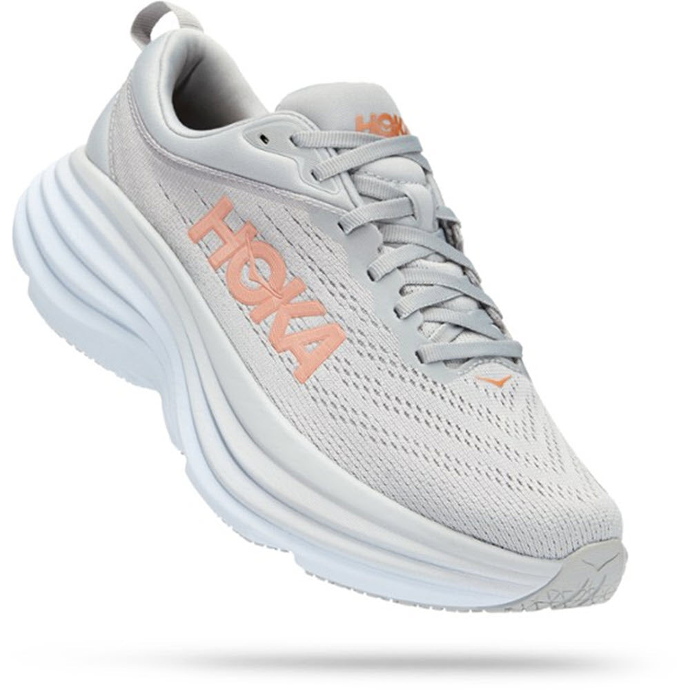 A single grey athletic shoe with a thick, ultra-cushioned white sole and the brand name &quot;Hoka&quot; in peach on the side, specifically the HOKA ONE ONE BONDI 8 Harbor Mist/Lunar Rock for women, is perfect for foot health.