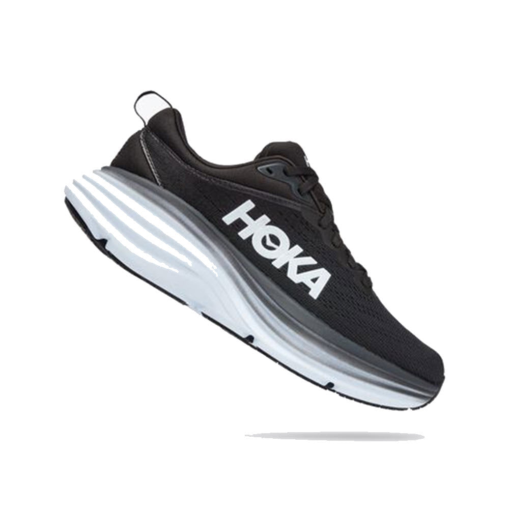 The ultra-cushioned HOKA ONE ONE BONDI 8 Black/White for women features a sleek black design with a white Hoka logo and a thick white sole, all set against a plain white background, crafted to ensure optimal foot health.