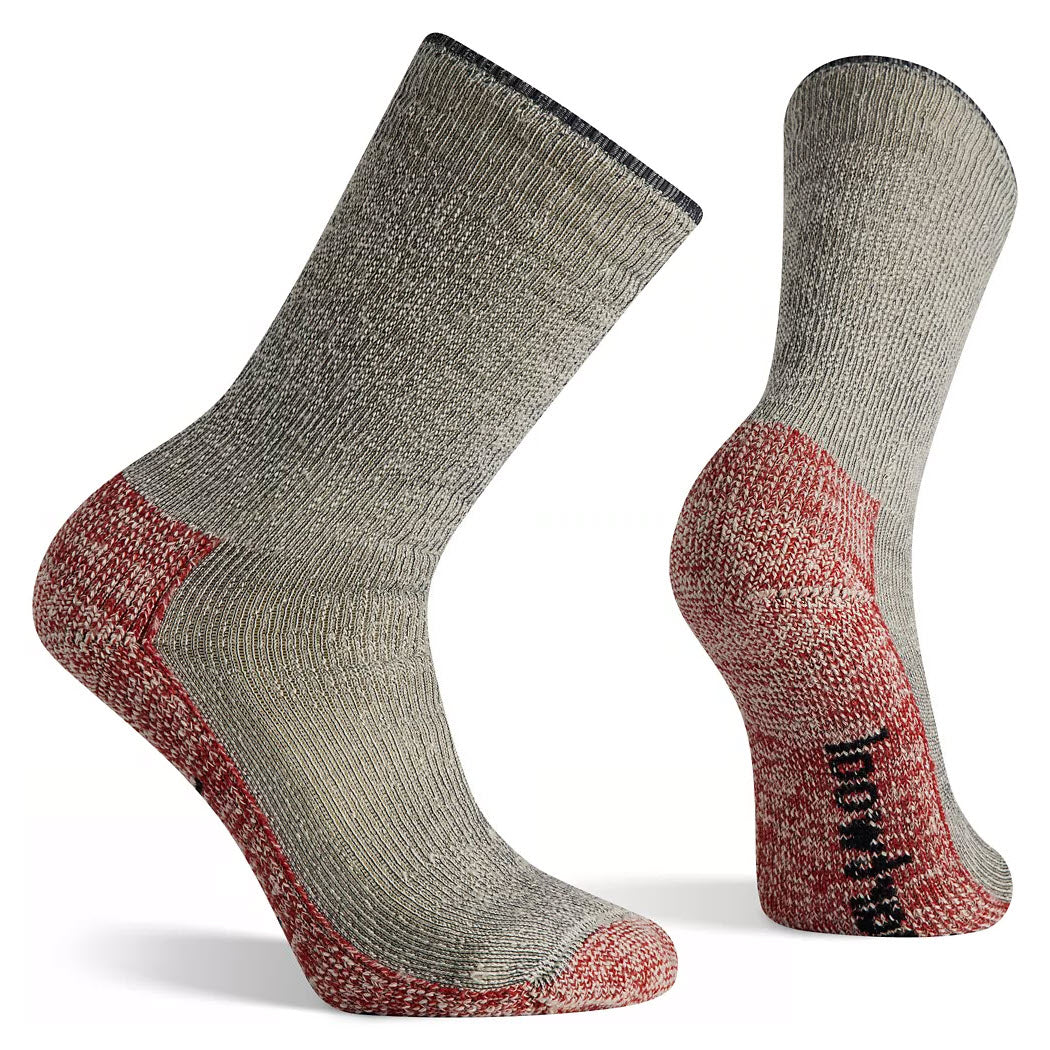 Two gray and red SMARTWOOL MOUNTAINEERING MAX SOCKS CHARCOAL - MENS are displayed, one upright and one angled to show the sole. The socks have a thick, ribbed texture and &quot;Smartwool&quot; written on the sole, designed for in-shoe comfort during long-distance hiking.