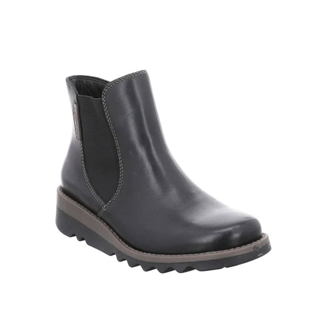 A single RIEKER LUG SOLE CHELSEA WITH ZIP BLACK - WOMENS from Rieker, with a low wedge heel and stretch fabric panels on the sides, perfect for wintertime walkability.