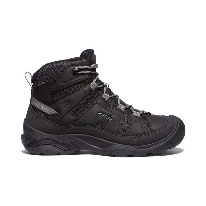 A single KEEN CIRCADIA MID POLAR 200 GM STEEL - MENS black hiking boot, featuring grey laces and a rubber sole, is photographed from the side on a white background. Designed by Keen for winter hiking, it is insulated and waterproof to ensure maximum comfort and protection.