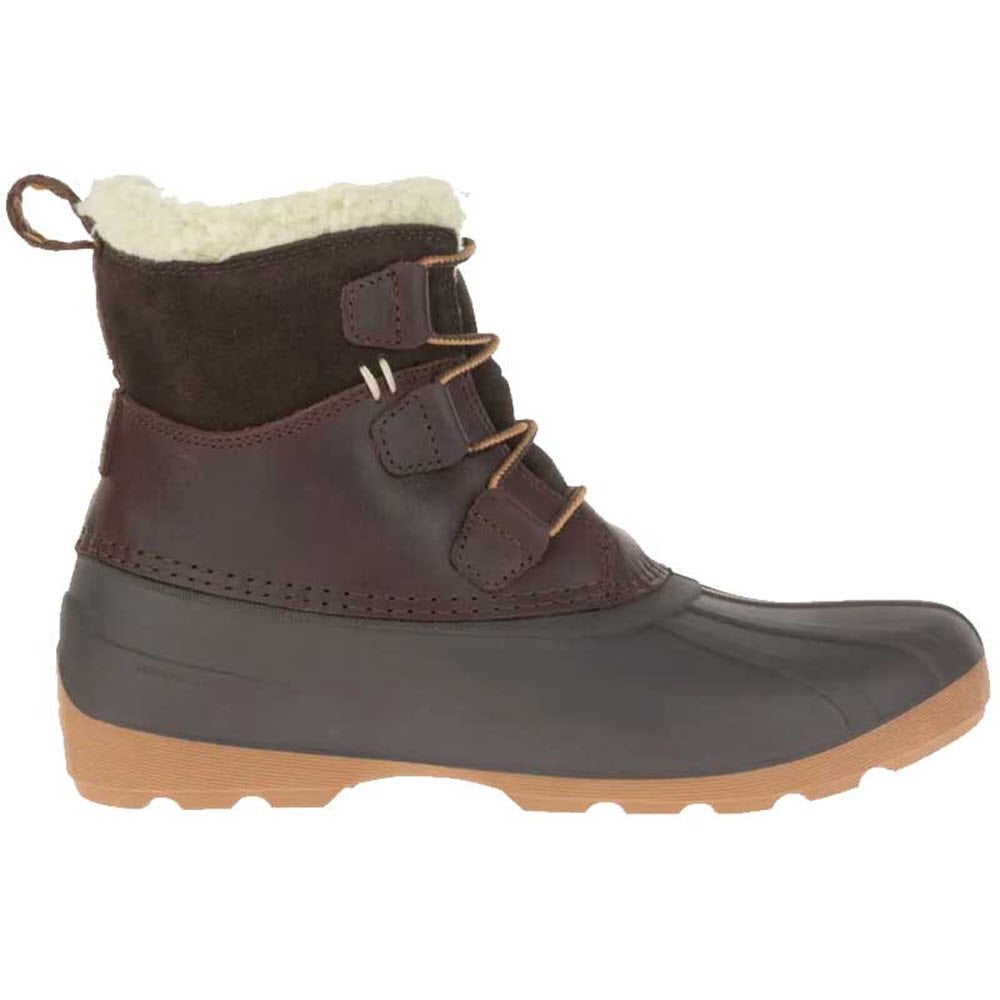 The KAMIK SIMONA MID DARK BROWN women&#39;s winter boots by Kamik feature a dark brown and black waterproof seam-sealed construction with a tan sole, lace-up front, and cozy faux fur lining.