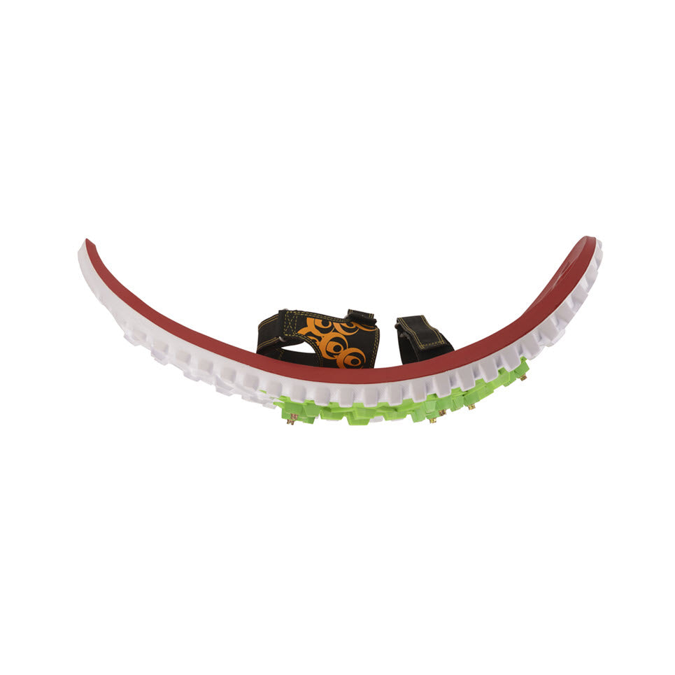 A toy balancing board with a curved red base, white edges, and green accents, featuring black and orange straps on top, designed like a rocker platform resembles the Crescent Moon CRESCENT MOON FOAM SNOWSHOES EVA RED - MENS.