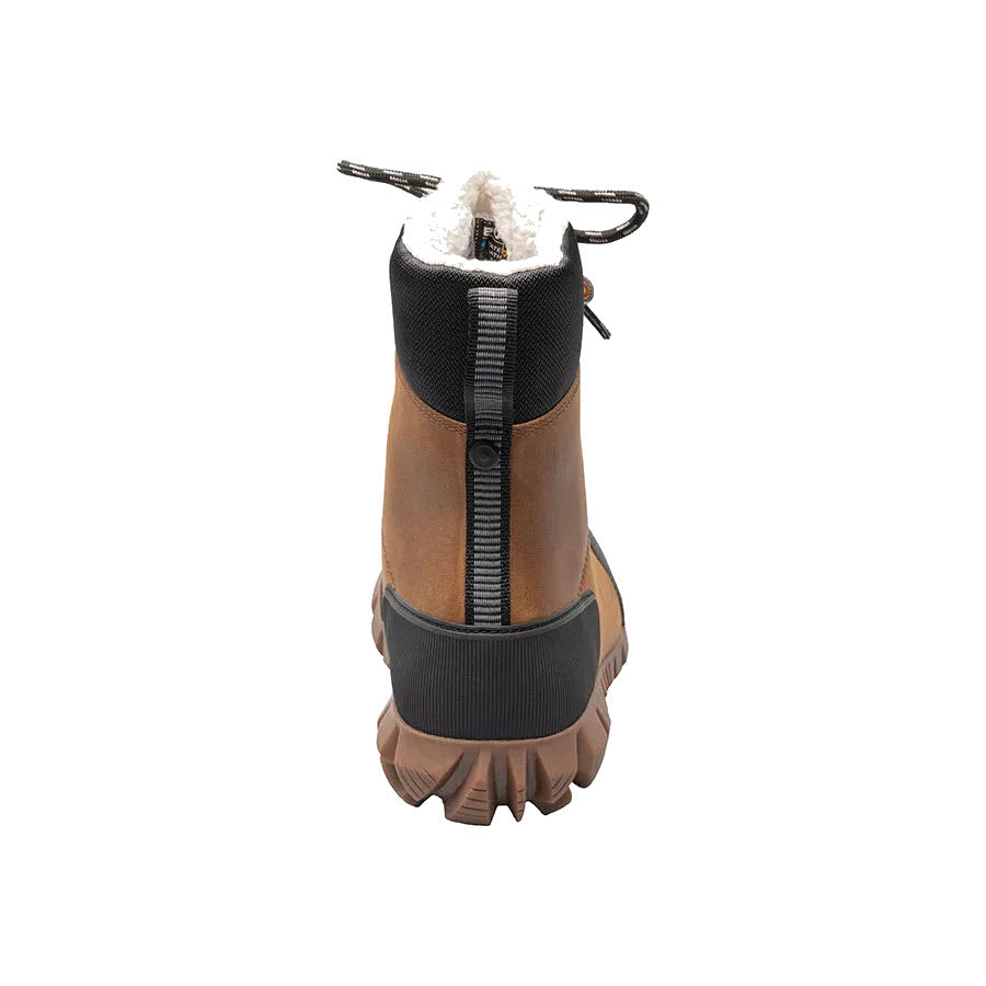 A single Bogs ARCATA LEATHER CARAMEL winter boot for women, featuring ultra-plush white lining, black trim, thick laces, and slip-resistant outsoles viewed from the back.