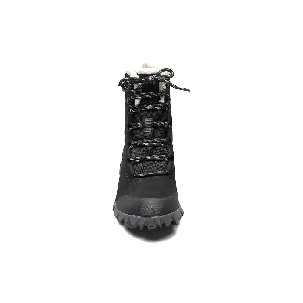 Introducing the BOGS ARCATA LEATHER BLACK - WOMENS by Bogs: A black winter boot with an ultra-plush fur lining, shown from the front. This boot features laces, waterproof leather, and a rugged, slip-resistant sole.