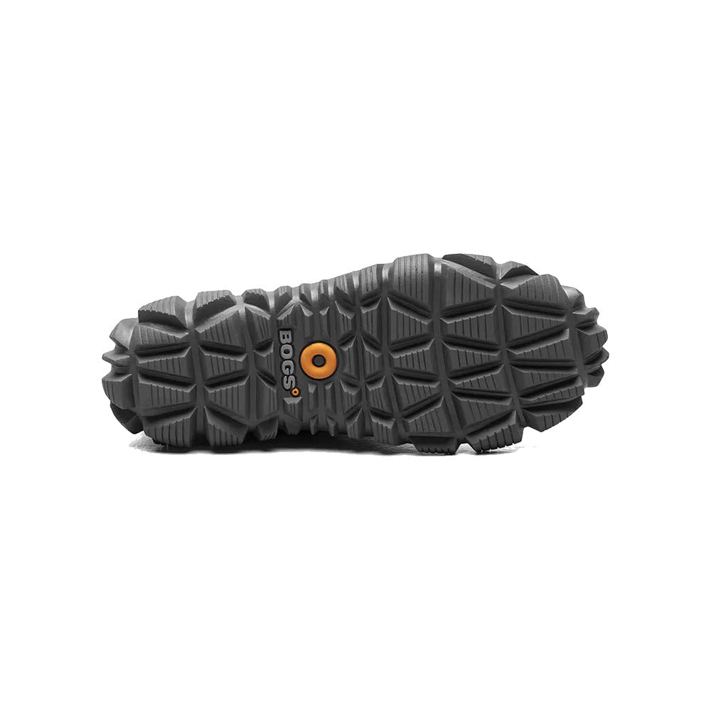 The image displays the sole of a women&#39;s BOGS ARCATA LEATHER BLACK boot, showcasing a rugged and textured tread pattern for improved grip, slip-resistant outsoles, with &quot;BOGS&quot; visible in white lettering and an orange circular detail.