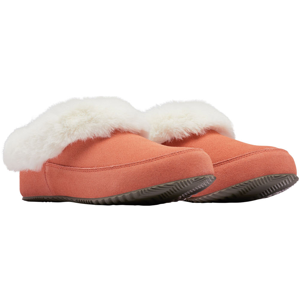 A pair of SOREL GO COFFEE RUN PARADOX PINK slippers from Sorel, featuring luxuriously soft construction with white faux fur lining and a tough, non-slip sole, is shown—perfect for quick trips outside.