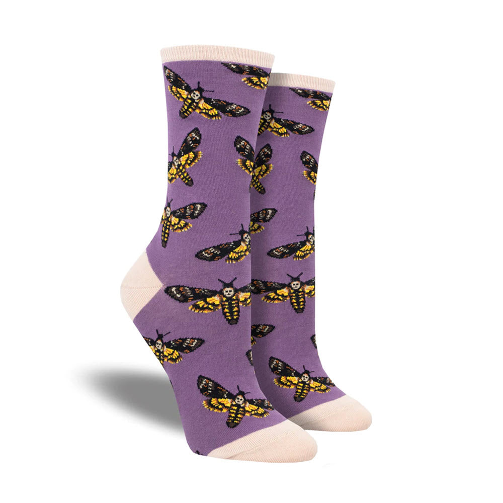 Socks with a pattern of yellow and black moths, available in sock size 9-11, suitable for women’s shoe sizes 5-10.5.