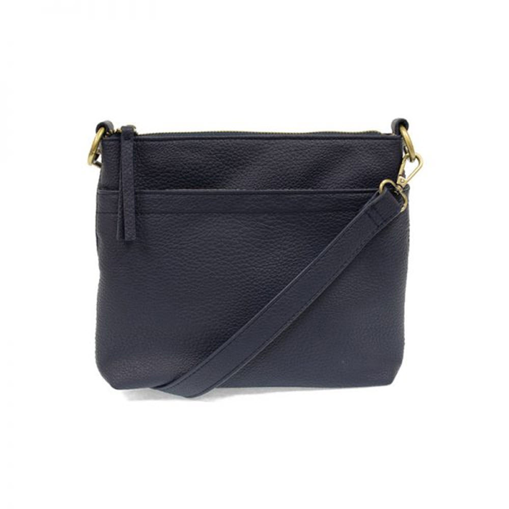 A JOY SUSAN LAYLA TOP ZIP BAG NAVY from Joy Susan is shown against a plain white background. This stylish and practical purse features exterior pockets for easy access to essentials.