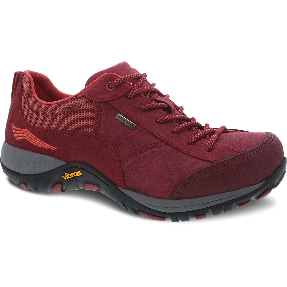 The Dansko Paisley Red Burnished - Women&#39;s is a sport-inspired walking shoe featuring a Vibram rubber outsole, mesh panels, and a lace-up design.