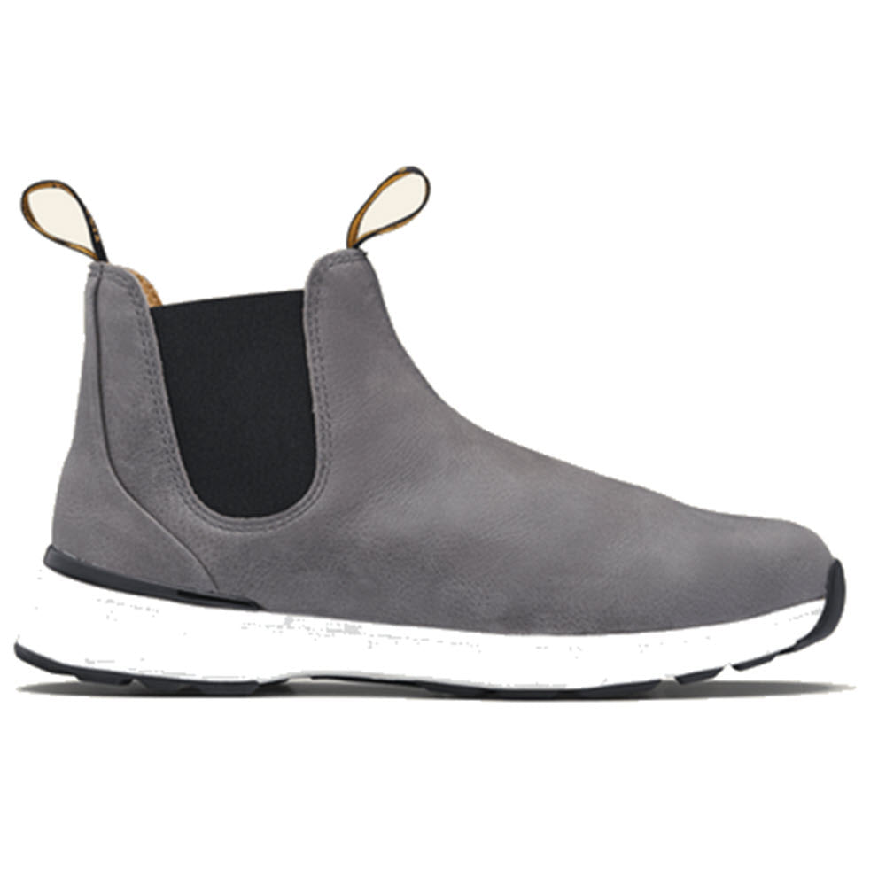 The BLUNDSTONE ACTIVE DUSTY GREY - WOMENS by Blundstone features a gray slip-on design, black elastic side panels, pull tabs, and a white sole, providing lightweight breathable comfort in the side view.