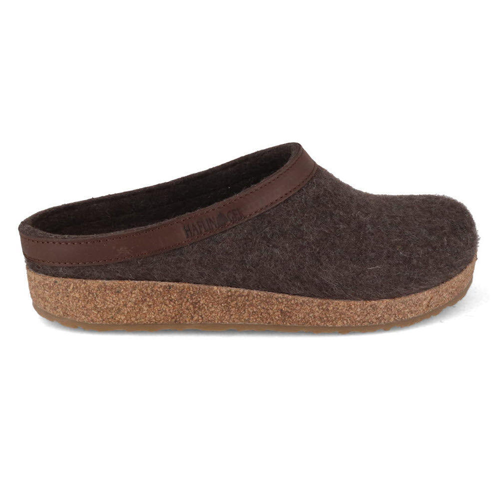 A HAFLINGERS GZL BROWN - WOMENS crafted from pure wool felt, featuring an anatomically shaped footbed, a cork sole, and a leather trim around the opening.