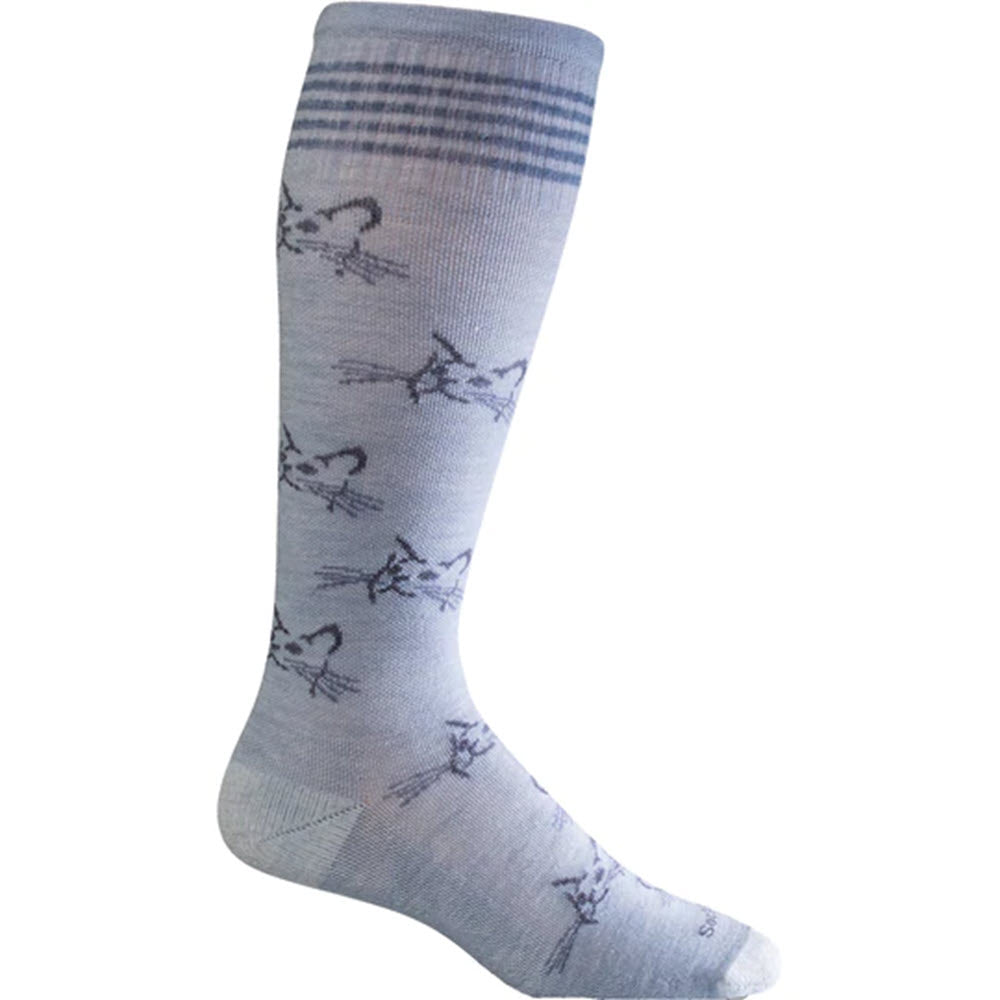 Introducing the Sockwell SOCKWELL FELINE FANCY CHAMBRAY 15-20 MMHG COMPRESSION SOCKS: a light blue knee-high pair featuring a pattern of cat faces and horizontal stripes near the top, made from luxurious Merino Wool with moderate graduated compression for all-day comfort.