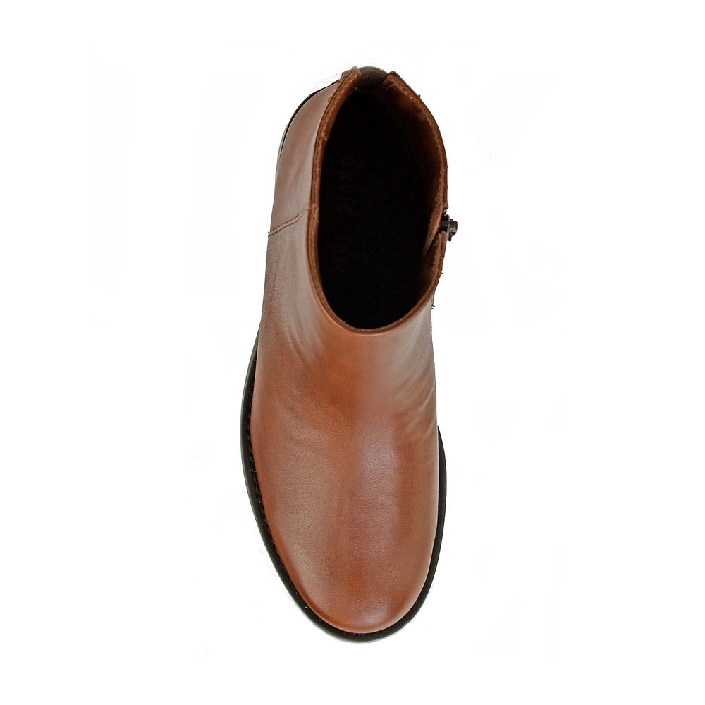 Top view of a single, sleek and classic DAVID TATE VOYAGE LUGGAGE - WOMENS brown leather ankle bootie with a rounded toe on a white background.