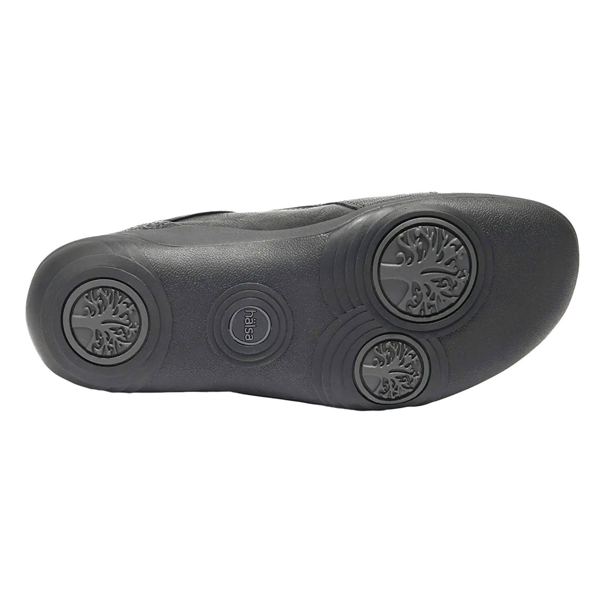 The image shows the sole of the HALSA ANNA BLACK LEATHER shoe from Halsa, featuring three round motifs that resemble tree-like structures. This stylish design perfectly complements the anatomically correct insole.