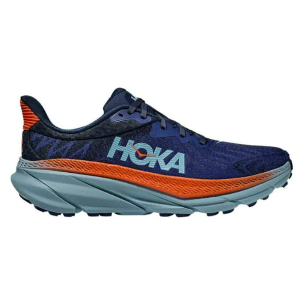 A blue and orange athletic running shoe with the brand name "Hoka" on the side, the HOKA CHALLENGER ATR 7 BELLWEATHER/STONE BLUE - MENS is perfect for versatile terrain. The thick, cushioned sole provides exceptional support.