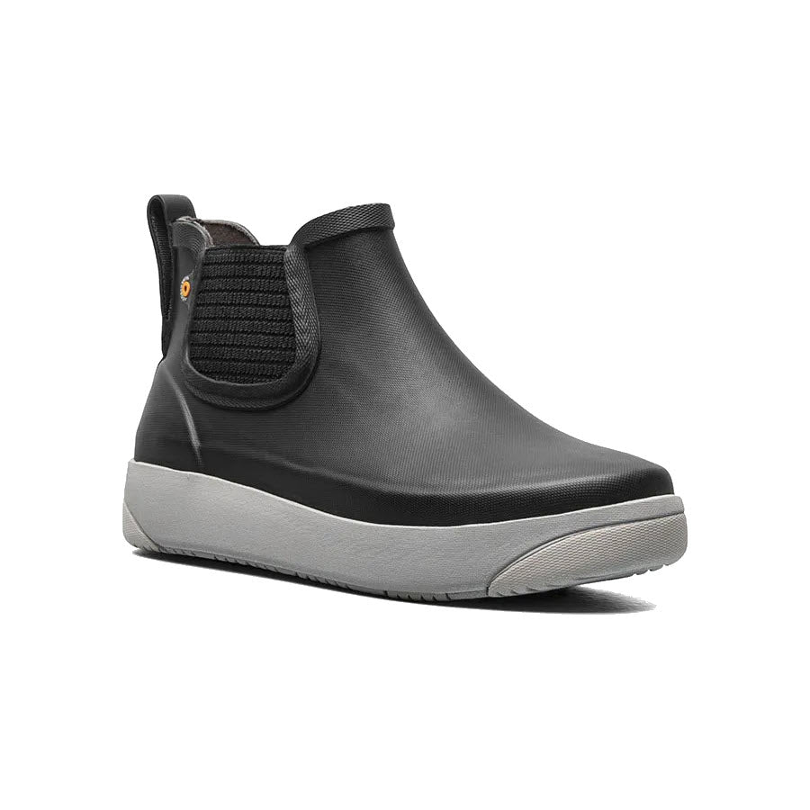 The BOGS KICKER RAIN CHELSEA II BLACK - WOMENS by Bogs is a functional slip-on ankle boot in black and grey, featuring a pull tab at the heel and a durable rubber sole.