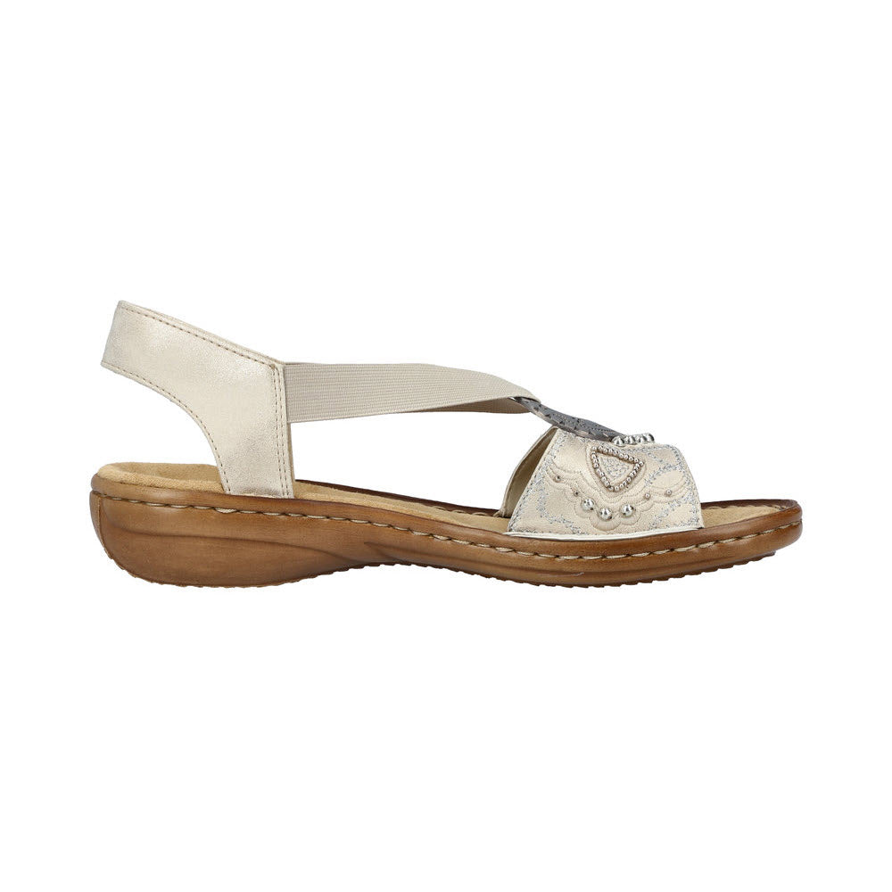 A single white RIEKER slingback flat with an adjustable ankle strap, decorative beads on the front, and a low wedge heel. The flat has a cushioned insole and visible stitching along the midsole.