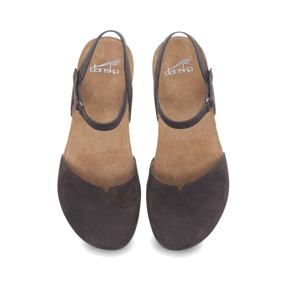 Top view of a pair of Dansko Rowan Chocolate hybrid sandals for women, featuring a slingback strap and suede insoles, perfect for completing your summer look.