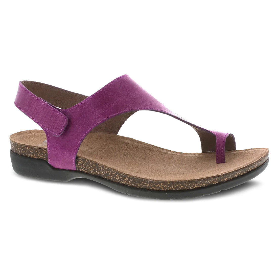 The Dansko Reece Magenta for women is a single, casual leather sandal in purple, featuring an adjustable back strap and a low heel on a clean white background.