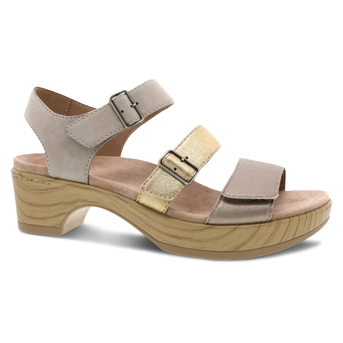 The DANSKO MALENA METALLIC MULTI - WOMEN'S sandal by Dansko features beige and gold leather uppers, three adjustable buckles, and a wooden platform heel.