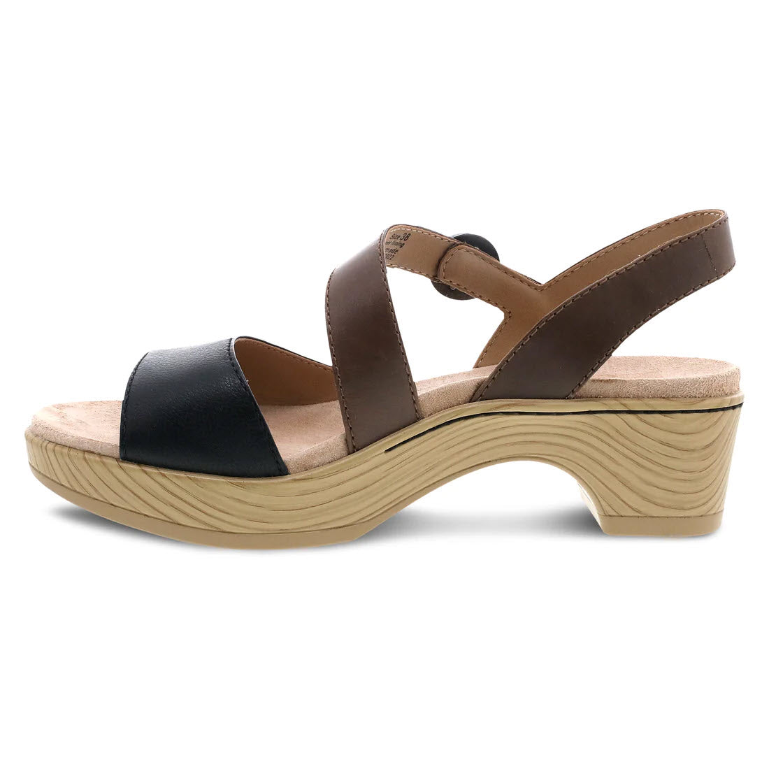 The Dansko Marjory Black Nappa women&#39;s sandal features a beige, block-heel design with leather uppers, a beige sole, a black front strap, and brown mid and back straps.