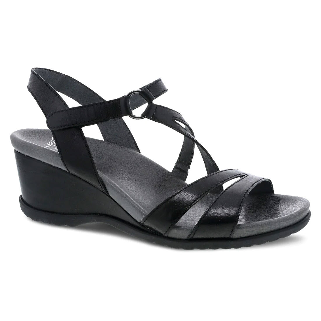 The DANSKO ADDYSON GLAZED BLACK - WOMEN&#39;S by Dansko is a black wedge sandal with a strappy design, featuring an adjustable ankle strap, a lightly cushioned sole, and a contoured EVA footbed for added comfort.